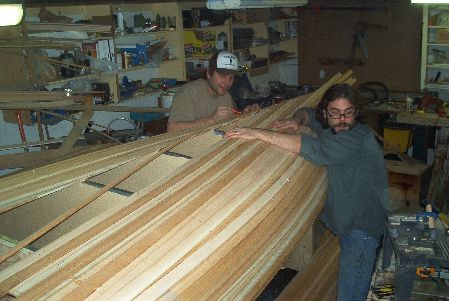 Martin building canoe